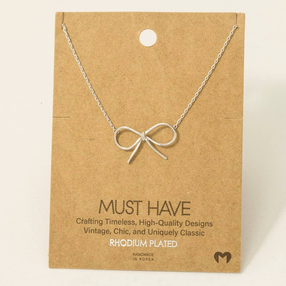 Gold Dipped Bow Tie Pendant Necklace: G