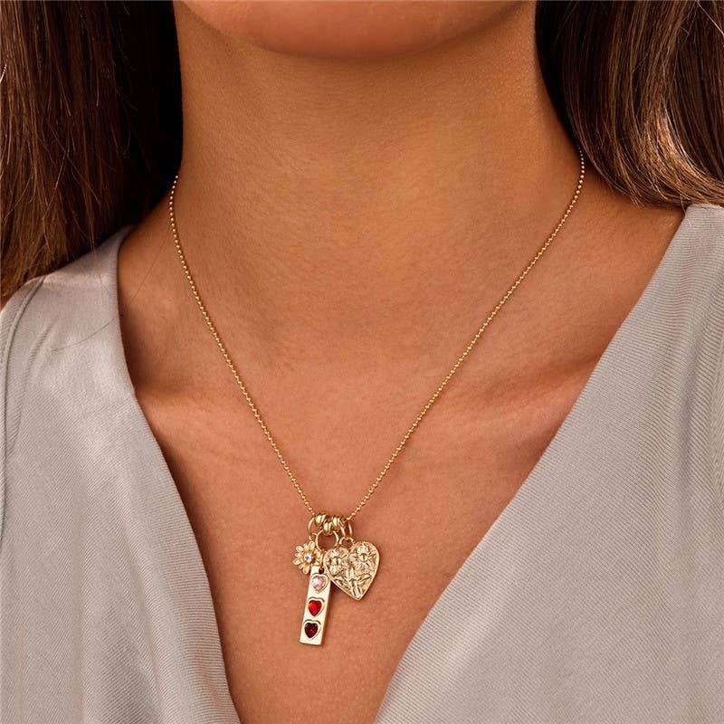 FLORAL HEART MULTI CHARM NECKLACE