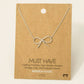 Gold Dipped Bow Tie Pendant Necklace: G